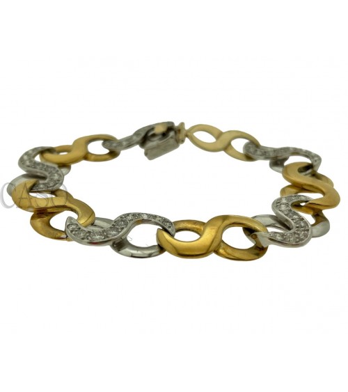 BRACCIALE NEI 2 COLORI DELL'ORO CON BRILLANTI