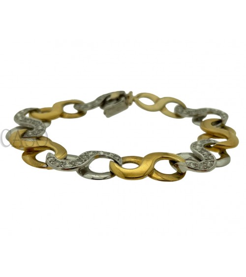 BRACCIALE NEI 2 COLORI DELL'ORO CON BRILLANTI