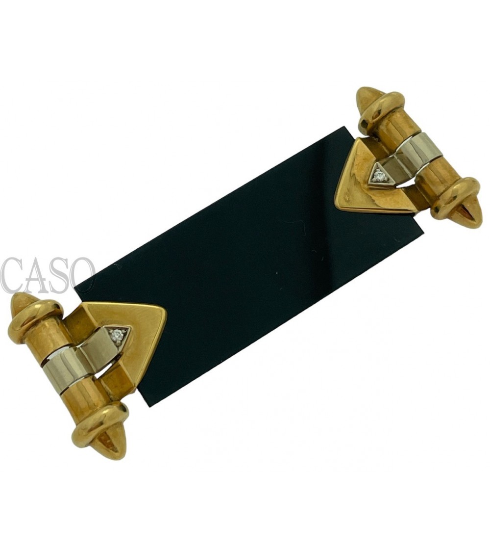 Onyx and gold brooch