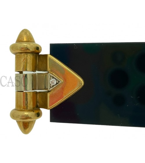 Onyx and gold brooch