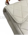 CHANEL MINI SQUARE VINTAGE IN PELLE BIANCO LATTE E BACHELITE