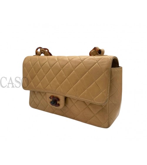 CHANEL VINTAGE MEDIA IN PELLE BEIGE CON BACHELITE