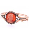 ANTIQUE BRACELET WITH A CORAL CAMEO ON A CORNIOLA BACK SET IN GOLD