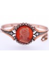 ANTIQUE BRACELET WITH A CORAL CAMEO ON A CORNIOLA BACK SET IN GOLD