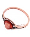 ANTIQUE BRACELET WITH A CORAL CAMEO ON A CORNIOLA BACK SET IN GOLD