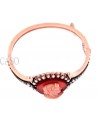 ANTIQUE BRACELET WITH A CORAL CAMEO ON A CORNIOLA BACK SET IN GOLD