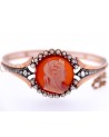 ANTIQUE BRACELET WITH A CORAL CAMEO ON A CORNIOLA BACK SET IN GOLD